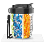 Week by week: Pill organizer with wide openings and carrying strap