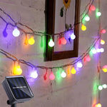 Solar-powered outdoor string lights