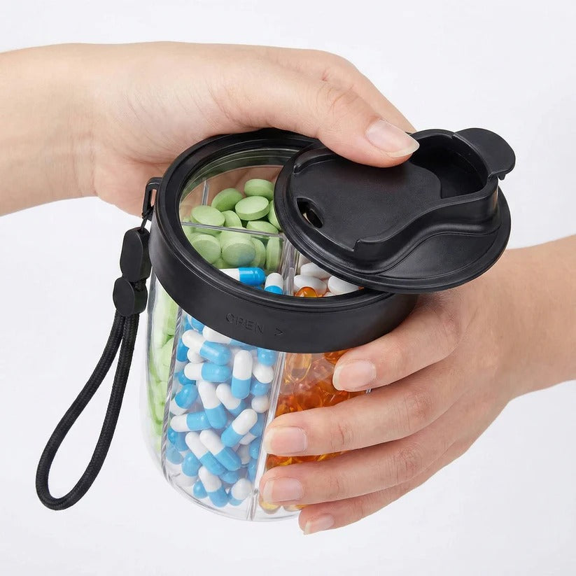 Week by week: Pill organizer with wide openings and carrying strap