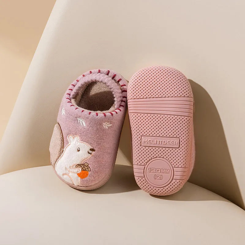 Comfortable kids' fleece slippers with a bear cartoon motif