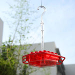 Hummingbird feeder with built-in ant moat