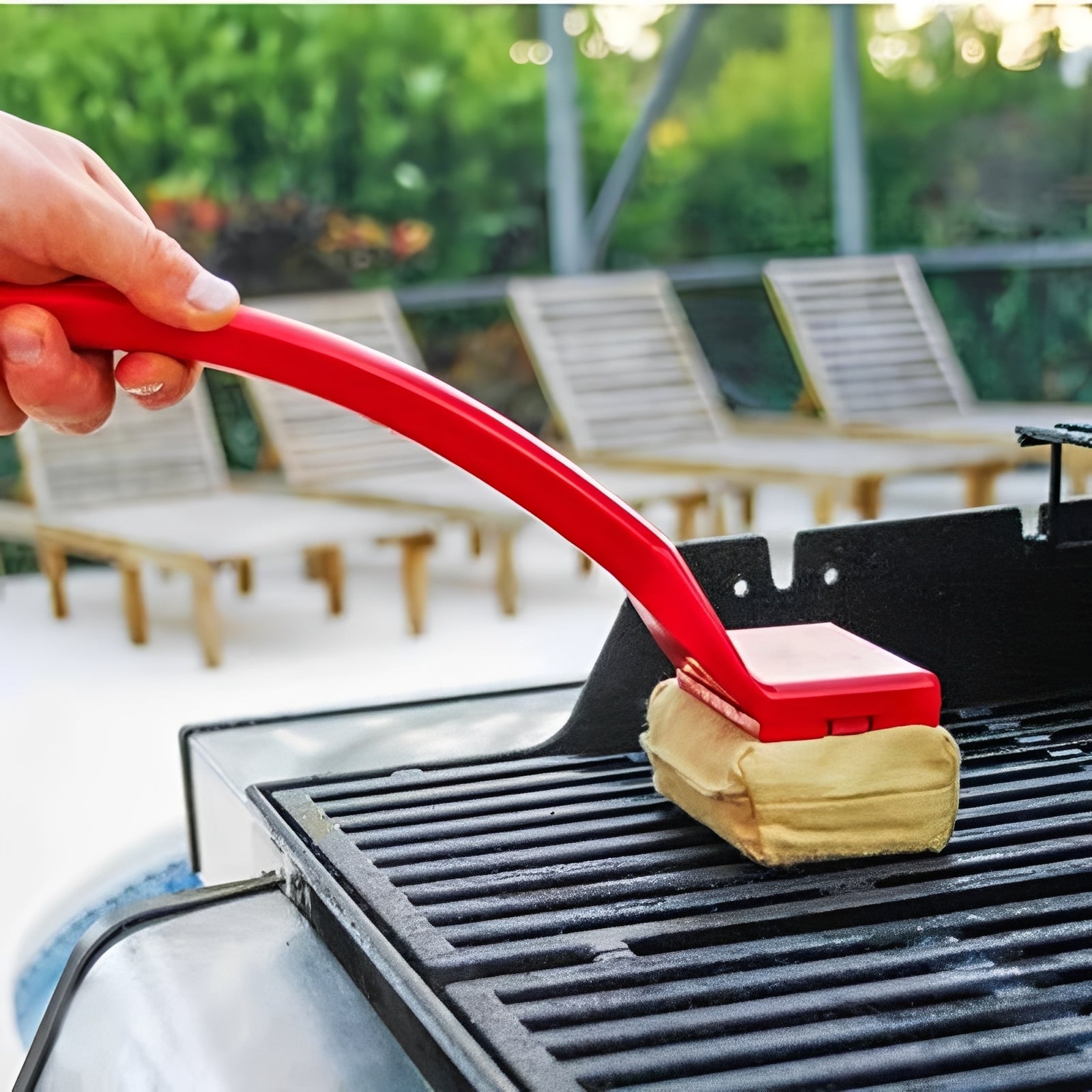 Long-handled grill cleaner with steam pad for effortless cleaning