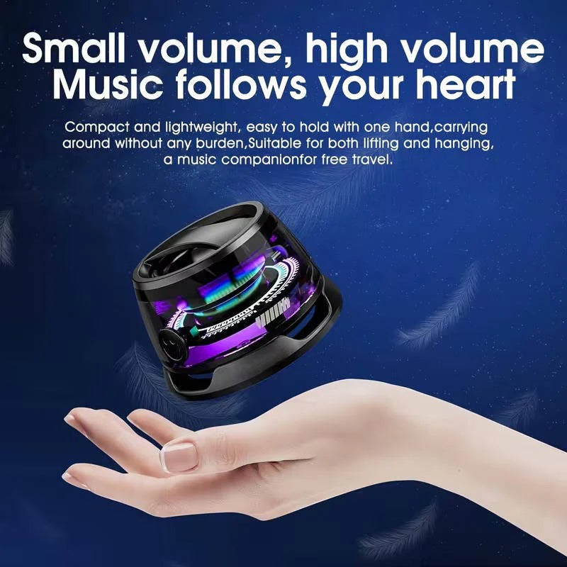 Compact Bluetooth speaker with magnetic base and RGB lighting