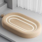 Cat bed with integrated scratching board for relaxed hours