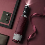 Wetterfester LED-Regenschirm mit reflektierenden Details und umgekehrtem Design