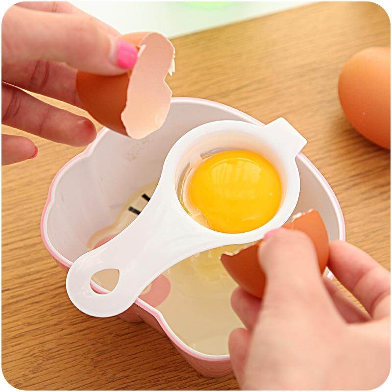 Egg separator for whites and yolks