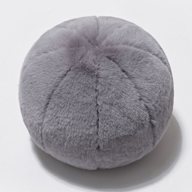 Round short-pile faux fur cushion