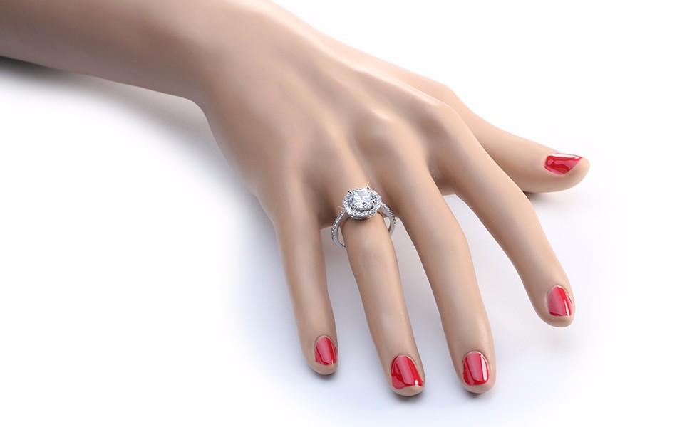 Ring with 1.4 ct CZ and circular crystal border