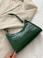 Elegante Baguette-Tasche im stilvollen Schlangenlook