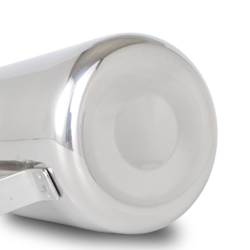 Elegant stainless steel coffee cup with milk froth design