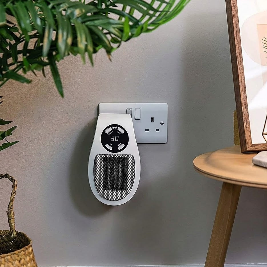 Compact fan heater with digital temperature control and timer