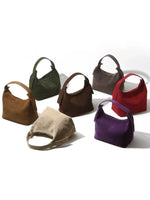 Elegante Schultertasche aus hochwertigem Wildleder